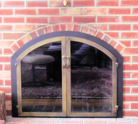 Osterville Arch Black finish, antique brass twin doors standard forged handles and smoke glass. No mesh, no Draft panel
